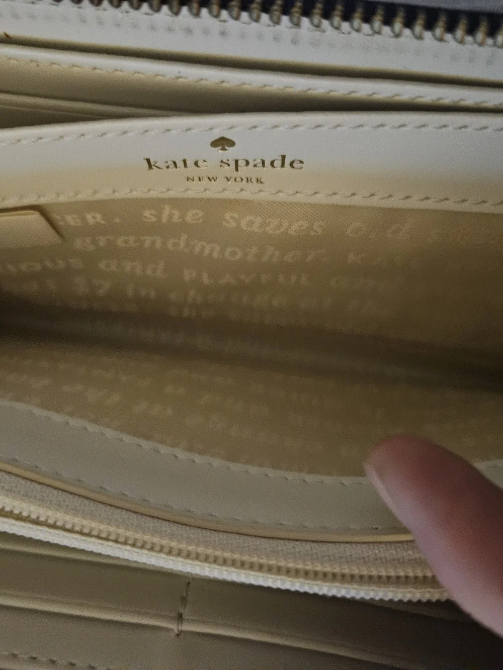 Kate Spade Black Checkbook Wallet with Green Hedgehog Print
